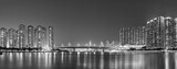 Fototapeta Londyn - Panorama of harbor and skyline of Hong Kong city at night