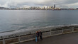 © Mat Hayward - Aerial view of a family of tourists on vacation visiting Alki Beach in West Seattle with a view of the city and the Puget Sound water