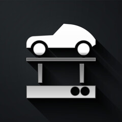 Sticker - Silver Repair car on a lift icon isolated on black background. Repair of the underbody, suspension, wheels and engine. Long shadow style. Vector Illustration.