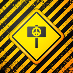 Poster - Black Peace icon isolated on yellow background. Hippie symbol of peace. Warning sign. Vector.