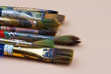 Art brushes in paint close-up