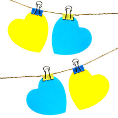 two hearts yellow and blue hanging on a rope with trailers