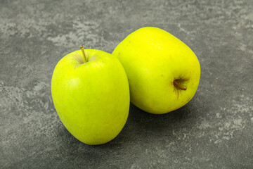 Two ripe green sweet apples