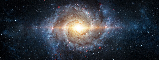 Wall Mural - a view from space to a spiral galaxy and stars. elements of this image furnished by nasa.