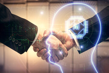 Double exposure of brain hologram and handshake of two men. Partnership in IT industry concept.