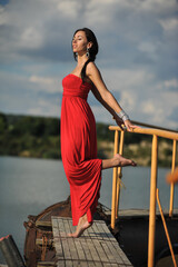  woman summer long red dress outdoor