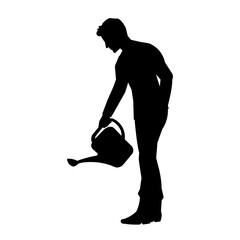 Silhouette of a man with a watering can takes care of the garden