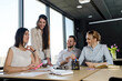© illustrissima - Team of young people in the office working