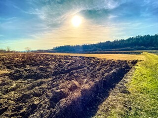 View of the tilled field in the countryside