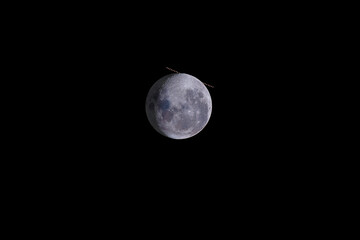 Wall Mural - an amazing astronomical event, moon surface covers planet mars awe night sky view with an advanced a