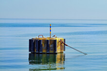 Calm Baltic Sea And A Buoy On Which A Seagull Sat.