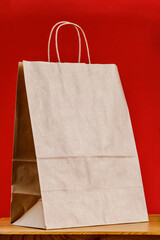 Wall Mural - Empty brown paper shopping bag with Handles.