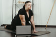© Vadym - overweight woman doing yoga workout at home