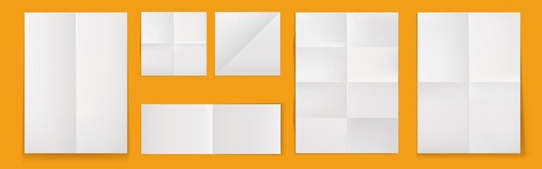 Wall Mural - folded blank posters, white paper sheets with crossing creases top view. vector realistic template o
