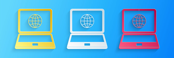 Wall Mural - Paper cut Globe on screen of laptop icon isolated on blue background. Notebook computer with globe sign. Paper art style. Vector.