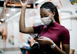 © Rawpixel.com - African American woman wearing mask on the bus while using public transportation in the new normal