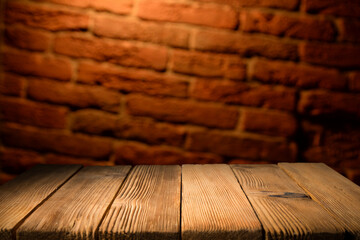 Wall Mural - Old wood table with smoke in the dark background.