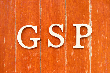 Sticker - Alphabet letter in word GSP (Abbreviation of Good Storage Practice or Generalized System of Preferences or Gross State Product) on old red color wood plate background