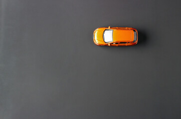 Toy car on black