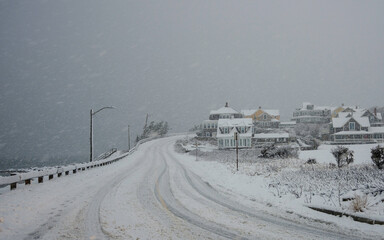 blizzard over the uphill coastal road on cape cod in february