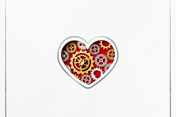 Wall Mural - white postcard with heart shape made of gears on red background