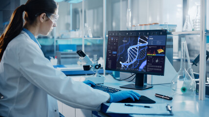 Wall Mural - advanced medical science laboratory: medical scientist working on personal computer with screen show