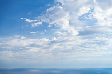 Wall Mural - empty coastal landscape blue sea under cloudy sky
