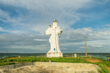 Wall Mural - Statue of Our Lady of Victory at the top of Morro do Leme viewpoint in Oeiras, Piaui - Brazil