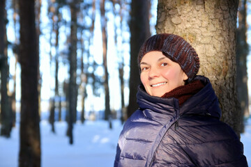 portrait of a woman in the winter forest 