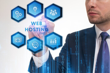 Business, Technology, Internet and network concept. Young businessman working on a virtual screen of the future and sees the inscription: Web hosting