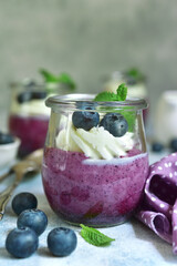 Wall Mural - Delicious summer dessert blueberry mousse with mint.
