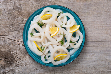 Wall Mural - Squid rings with lemon and rosemary