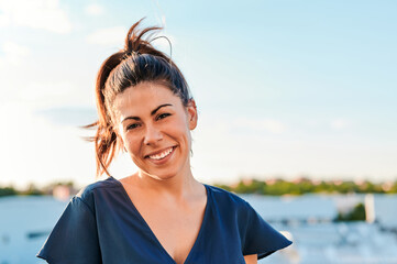 portrait of smiling young woman looking at camera