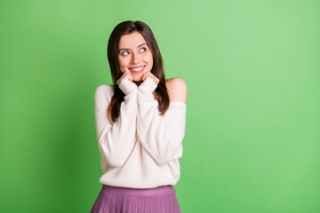 Poster - Photo of young beautiful lovely happy cheerful smiling dreamy girl look copyspace isolated on green color background