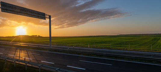 Wall Mural - Sunrise over the highway in Poland