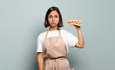 Wall Mural - young pretty chef woman. fast food concept