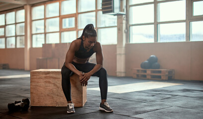 Woman taking a break from working out