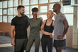 © Flamingo Images - Diverse friends laughing together after working out a the gym