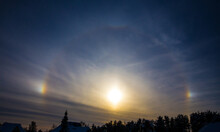 Rainbow Around Sun Is Called Sundogs Also Known As Parhelion, Parhelia. Rare Weather Effect In Winter In Cold Weather. Sun Reflecting From Ice Crystals.

