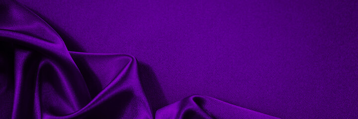 Wall Mural - Black blue purple silk satin background. Copy space for text or product. Wavy soft folds on shiny fabric. Luxurious deep lilac background. Valentine, Christmas, Anniversary, Black Friday. Web banner.