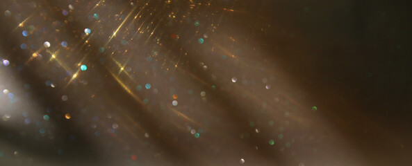 background of abstract gold and silver glitter lights. defocused