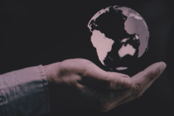 Poster - Protect our world in human hands and nebula dust. Macro  photography view. Close-up of pixel.