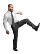 caucasian businessman in kicking position.
