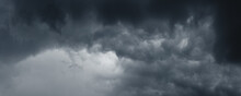 Background Of Dark Stormy Ominous Clouds In Gray Moody Sky
