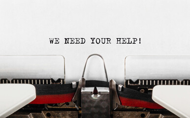 Wall Mural - Text We Need Your Help typed on retro typewriter