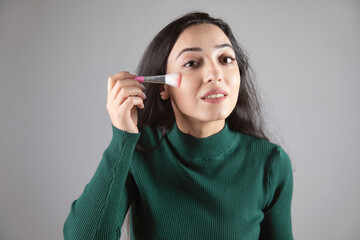 Poster - woman holding brush