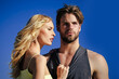© Volodymyr - Sensual lovers, Girlfriend and boyfriend. Relations of happy family, future. Couple in love on blue sky background. Muscular man and woman, . Love and romance