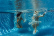 © Milles Studio/Stocksy - Women diving into pool
