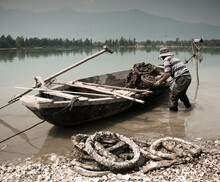 Vietnamese Oyster Fisherman