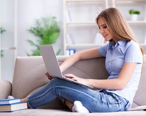 Young female student preparing for college exams